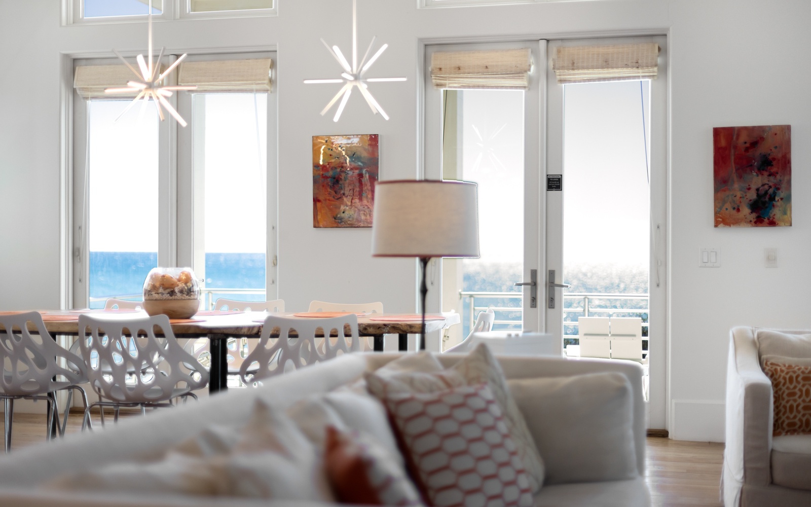 Relax in your bright, airy living space where modern furnishings meet stunning gulf views through floor-to-ceiling windows.