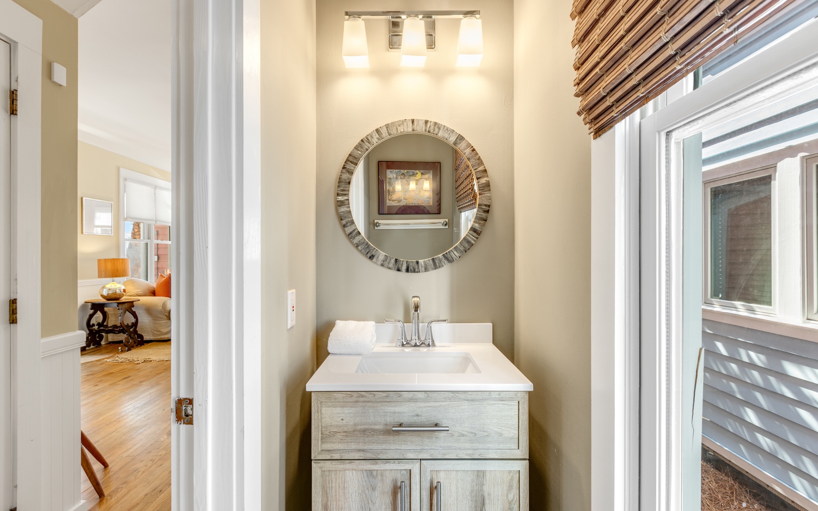 Step into your private powder room featuring elegant vanity, stylish mirror, and warm natural lighting for your daily rituals.