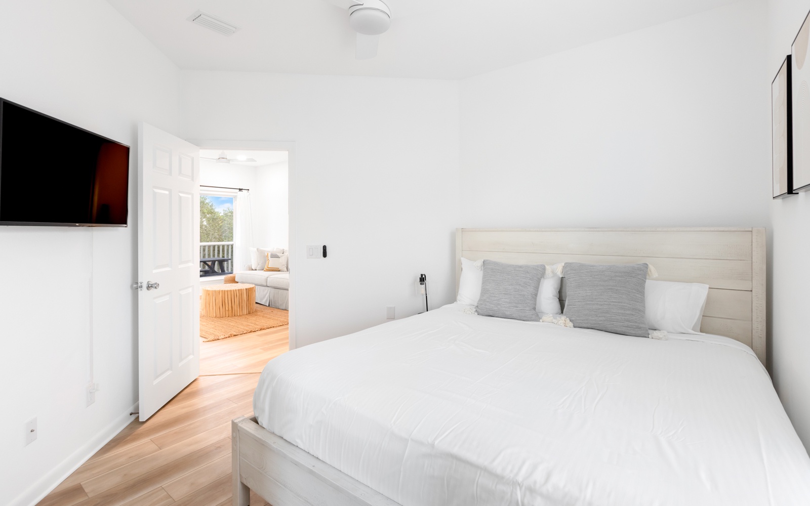 Drift into peaceful sleep in your modern bedroom with crisp linens and calming white tones that create the perfect restful retreat.