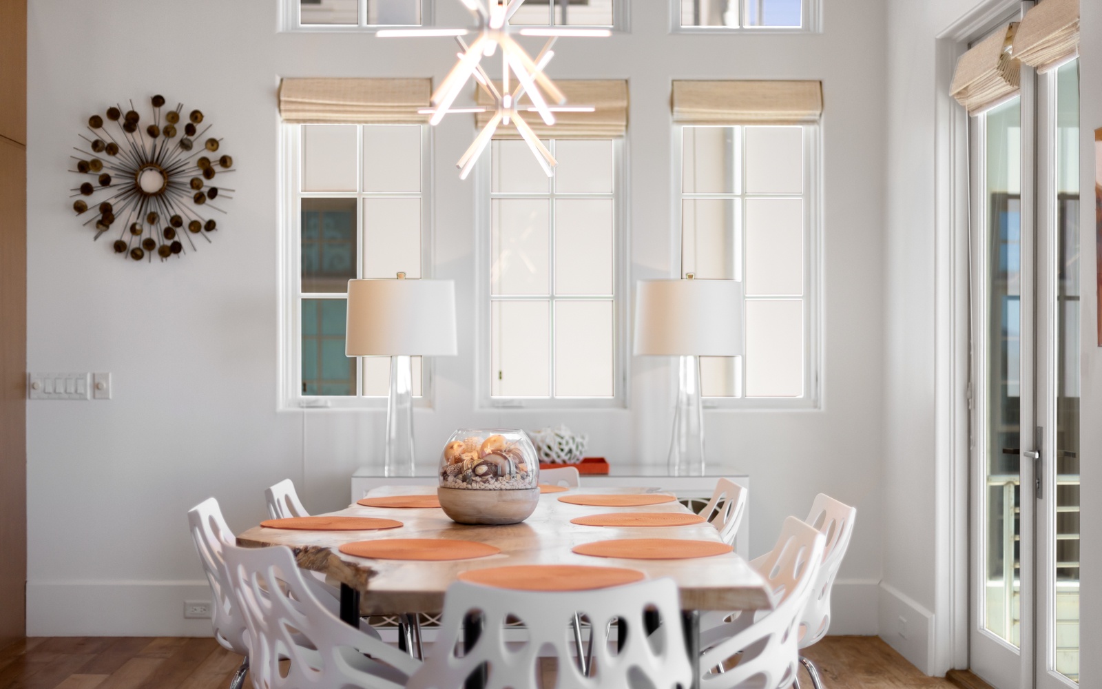 Your elegant dining space awaits with warm natural light, stylish furnishings, and a welcoming table perfect for memorable meals together.