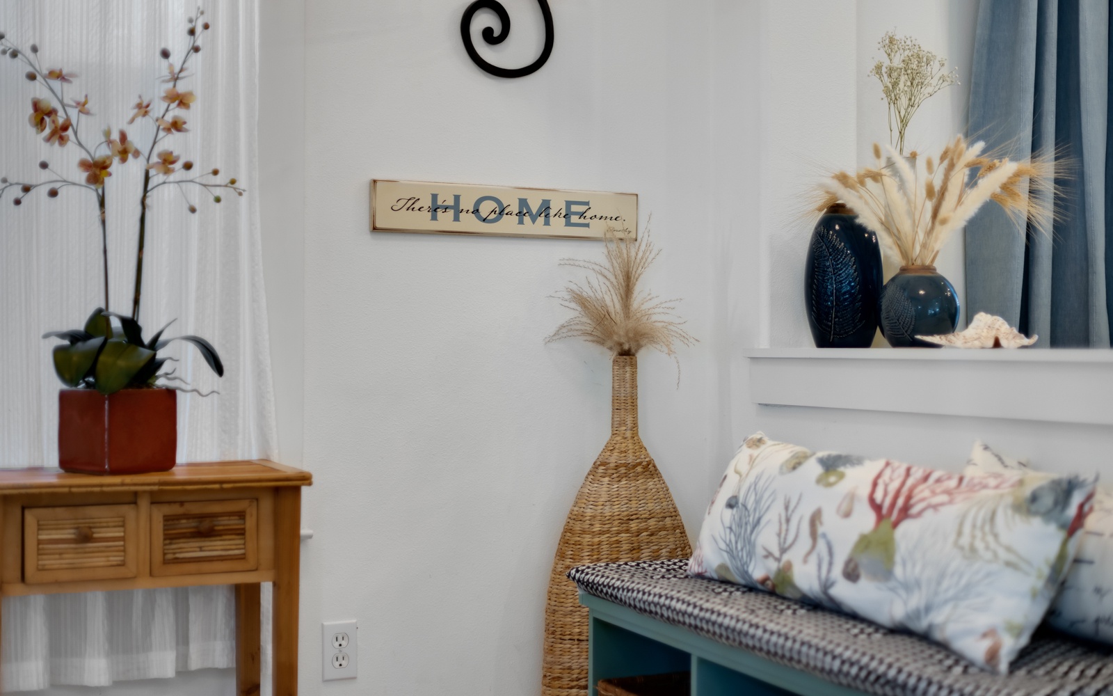 Sink into comfort surrounded by thoughtful touches—coastal decor and warm textures create your perfect home-away-from-home retreat.