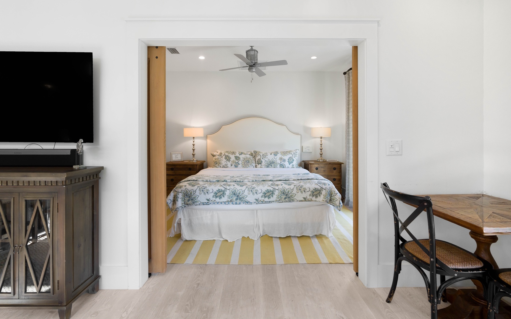 Step into your serene bedroom sanctuary, where soft botanical linens and warm bedside lighting create the perfect retreat for peaceful nights.