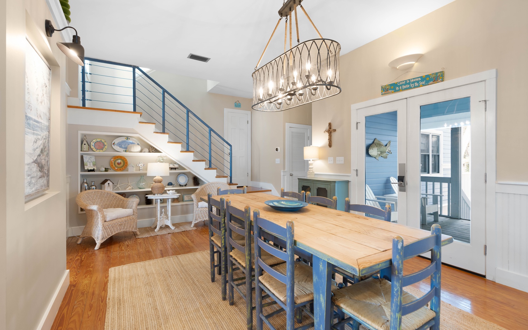 Gather around your charming dining table beneath nautical-inspired lighting, with coastal decor creating a relaxing atmosphere for memorable meals together.