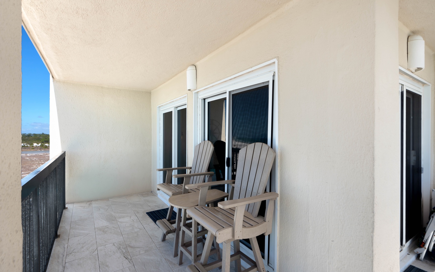 Settle into your private balcony chairs and breathe in the fresh air while enjoying peaceful moments outdoors.