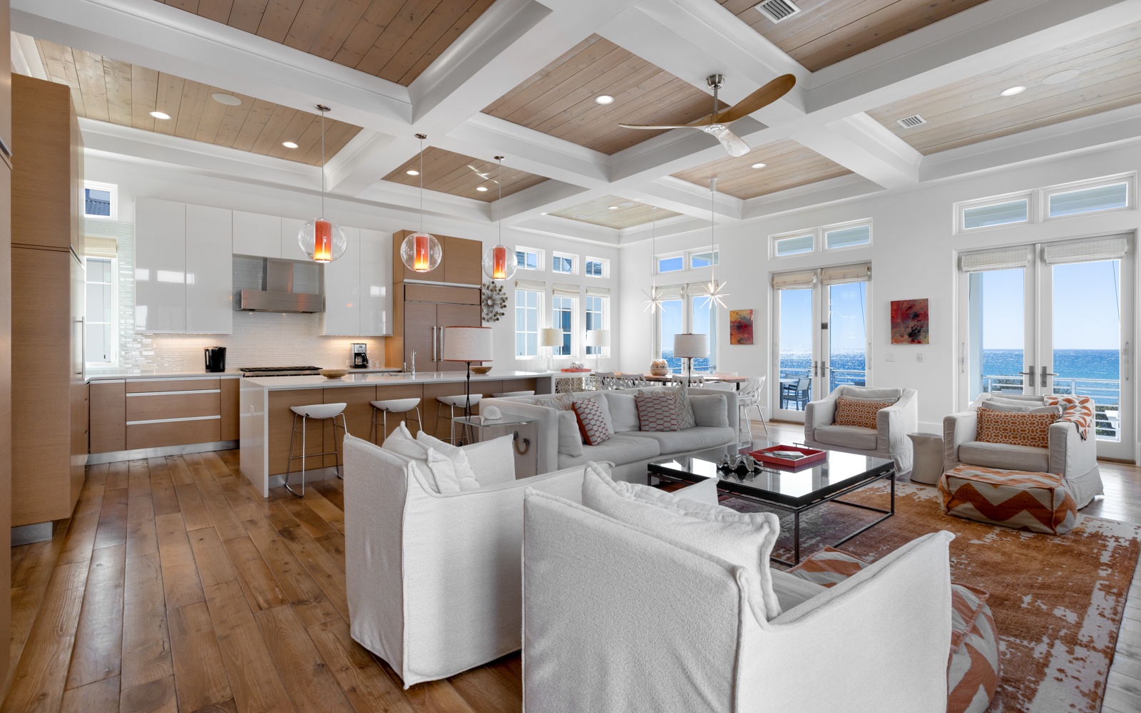 Relax in this stunning open-concept space where modern luxury meets coastal charm, with gulf views streaming through floor-to-ceiling windows.