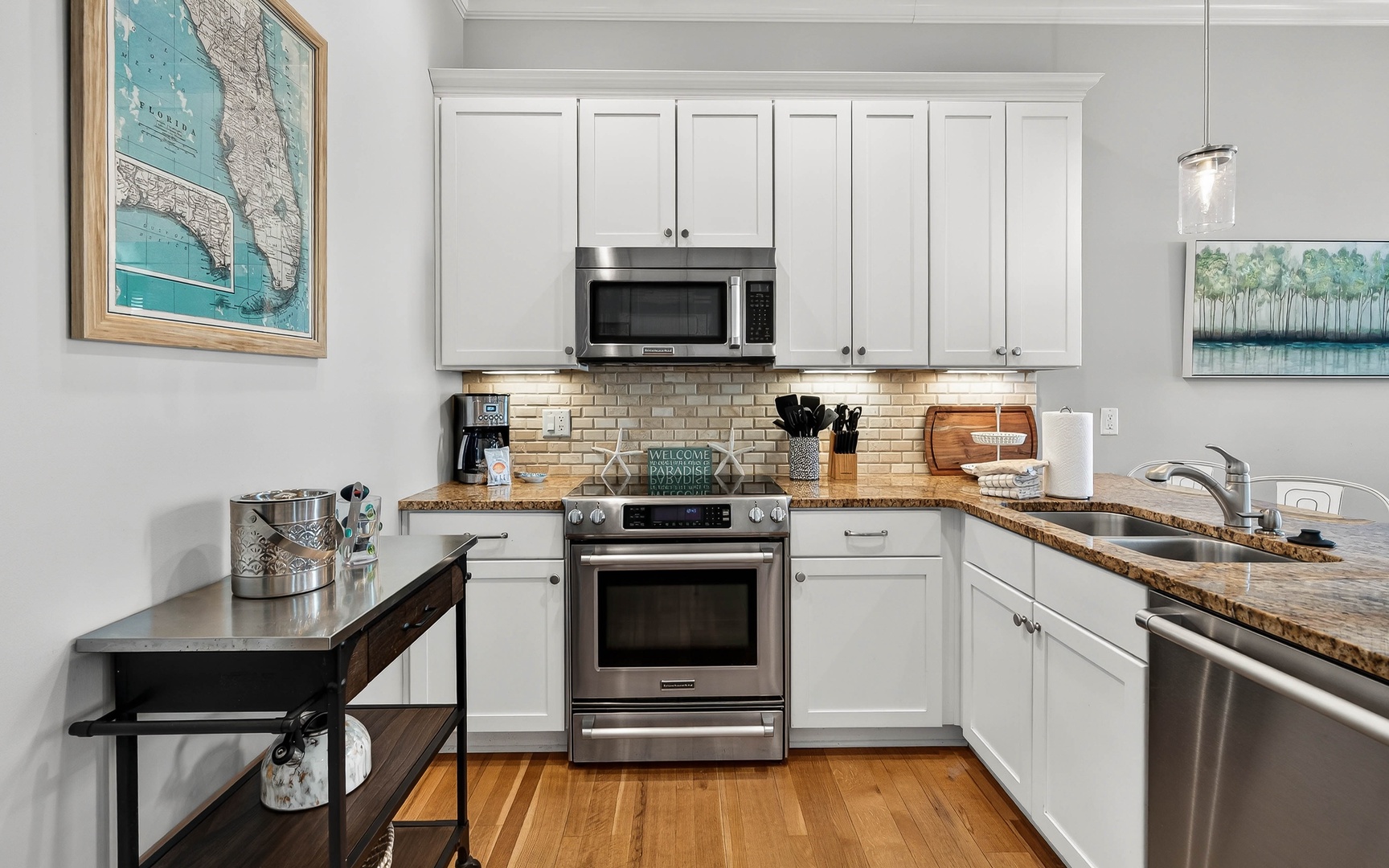 Your fully equipped kitchen awaits with granite countertops, stainless appliances, and everything needed for memorable meals together.