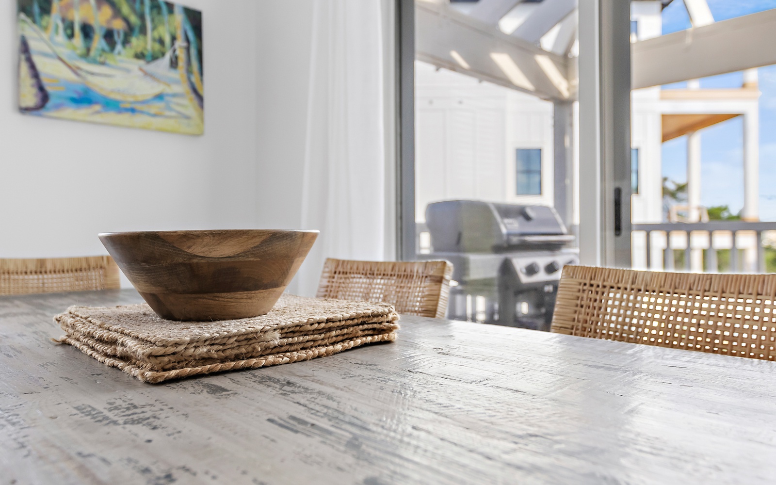 Gather around this beautiful dining table where meals become memories, with your private BBQ grill just steps away on the terrace.