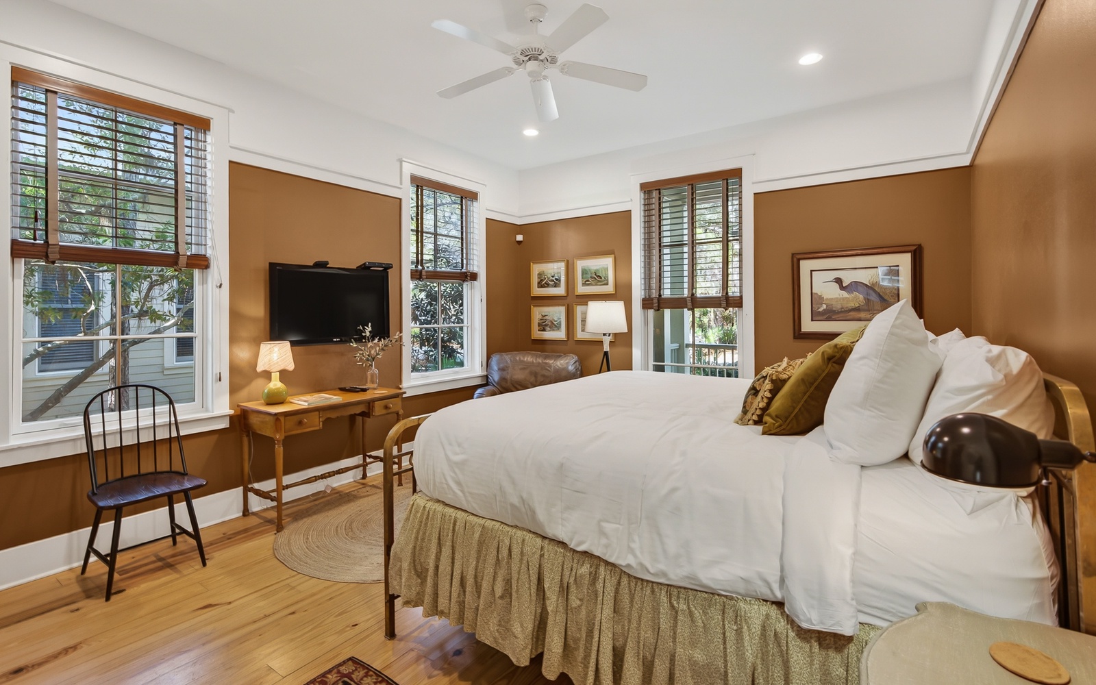 Unwind in your cozy bedroom with warm earth tones, crisp linens, and charming touches that create the perfect retreat.