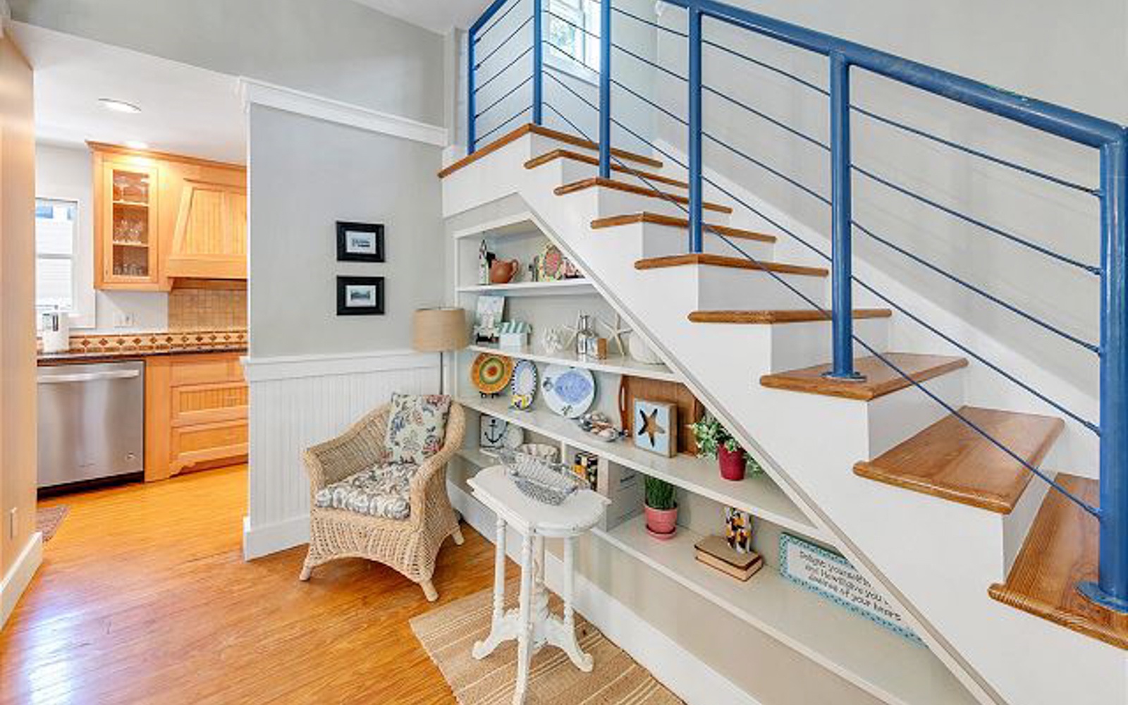 Relax in your cozy reading nook beneath the stunning staircase, with built-in shelving for your favorite books and treasures.