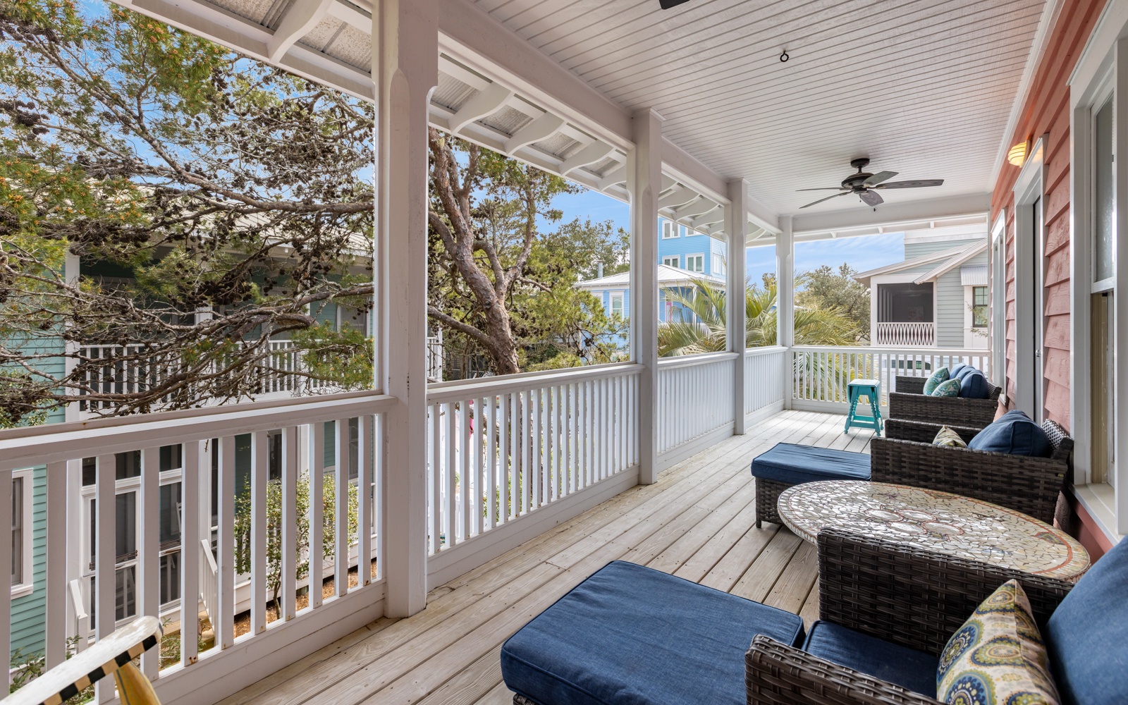 Unwind on your private screened porch with comfortable seating and ceiling fan - perfect for morning coffee or evening relaxation.