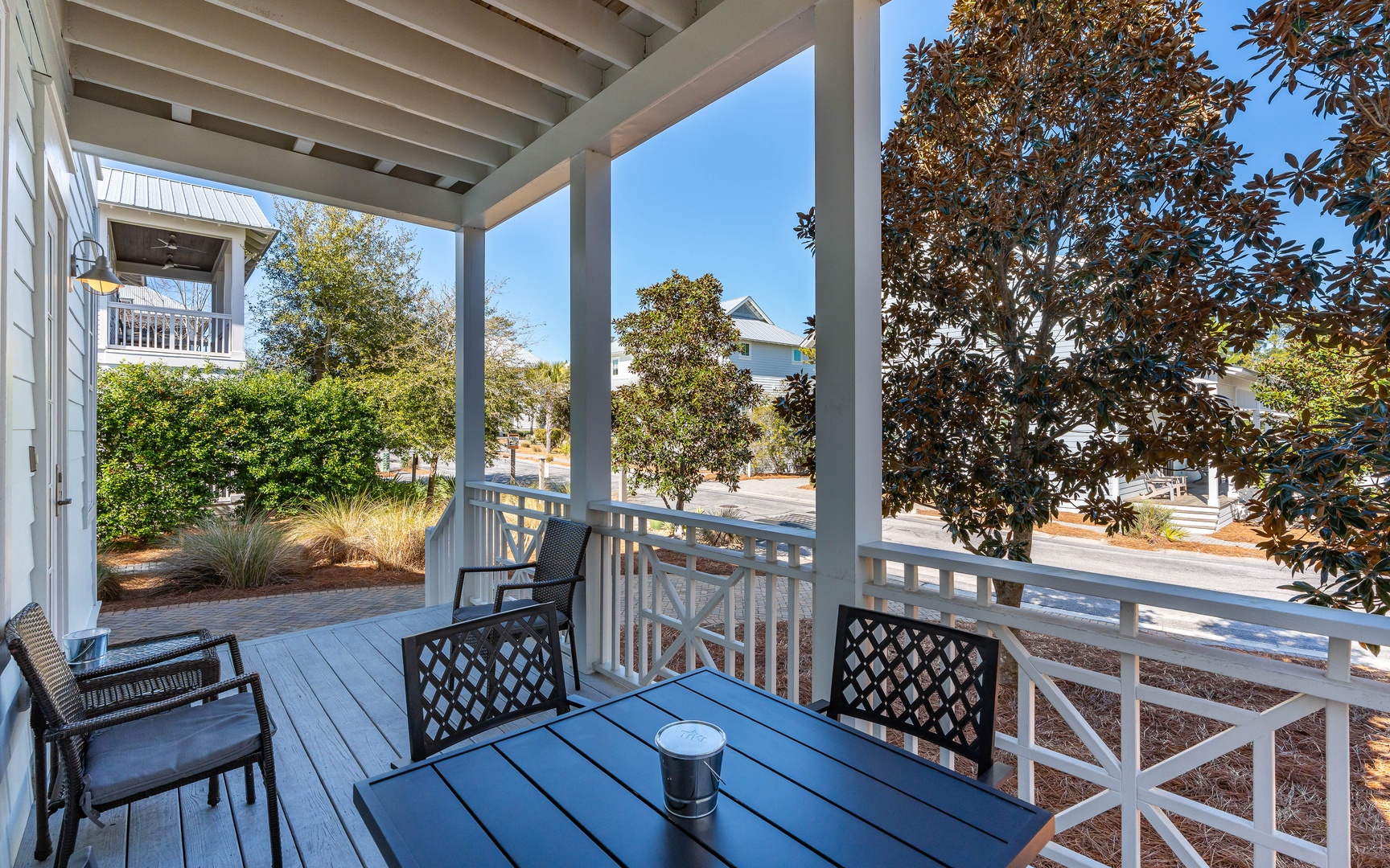 Start your mornings with coffee on this charming covered porch, where neighborhood views and gentle breezes create the perfect spot to unwind.