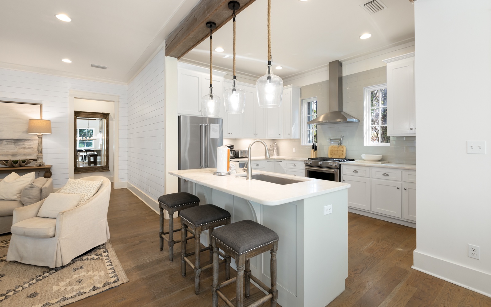 Your chef-worthy kitchen awaits with sleek countertops, modern appliances, and a perfect island for morning coffee or evening conversations.