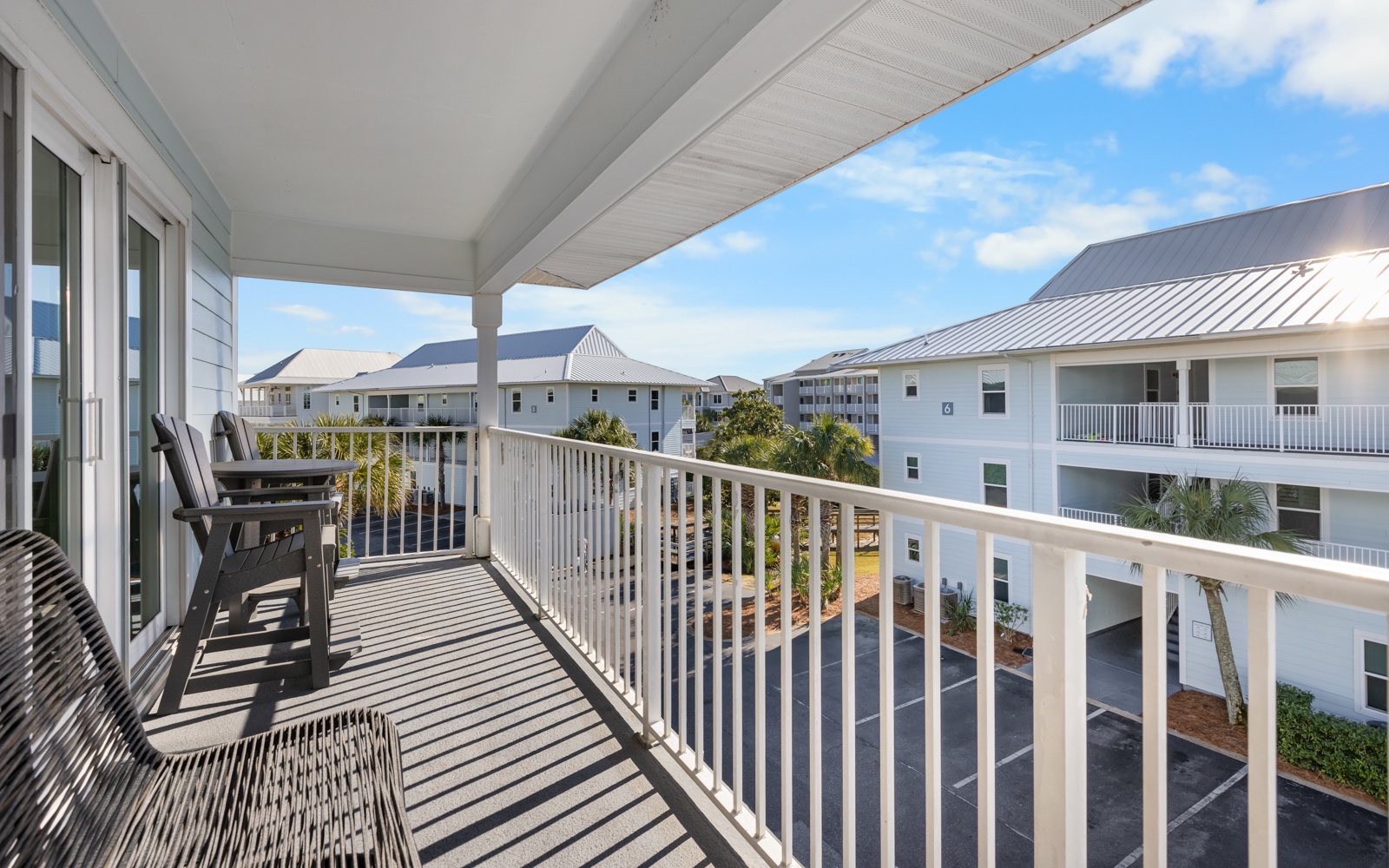 Step onto your private balcony and soak in the coastal charm. Sip morning coffee as gentle breezes carry ocean scents through this peaceful retreat.