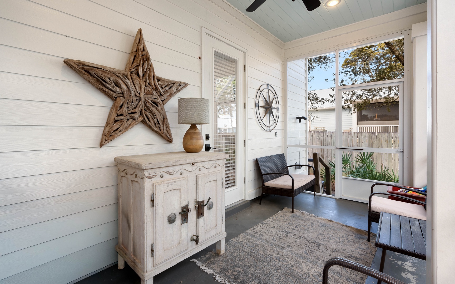 Relax in your private sunroom where rustic charm meets comfort—perfect for morning coffee or evening reading sessions.