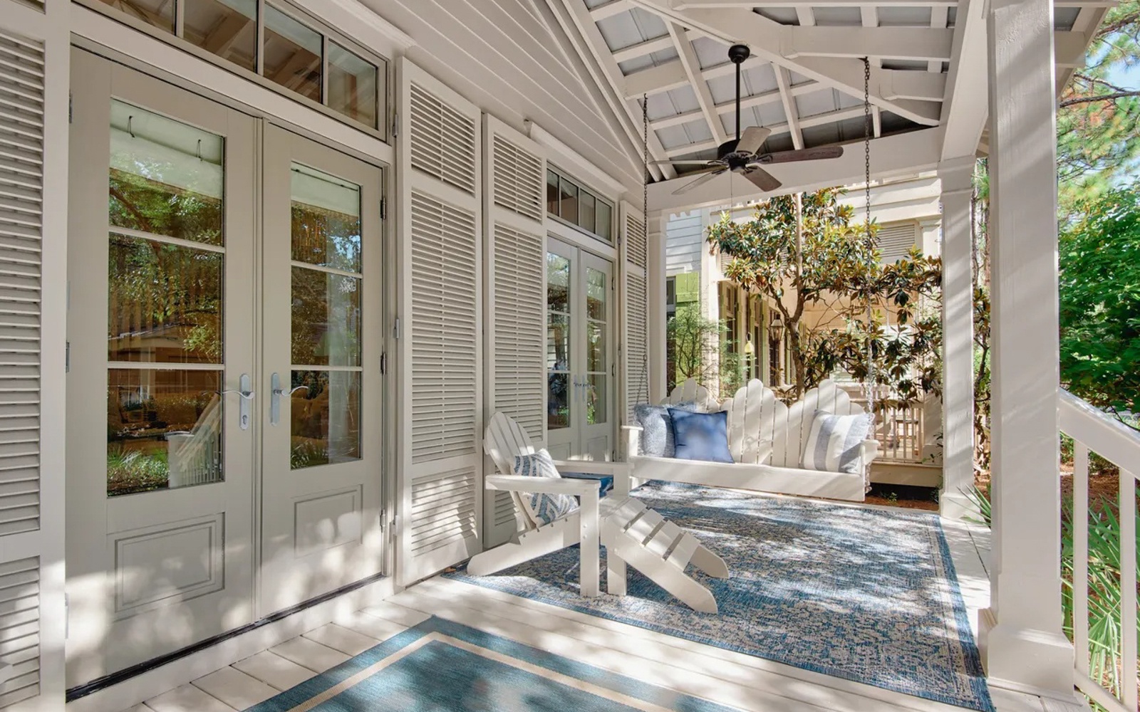 Unwind on your private covered porch with plush seating and gentle breezes flowing through.
