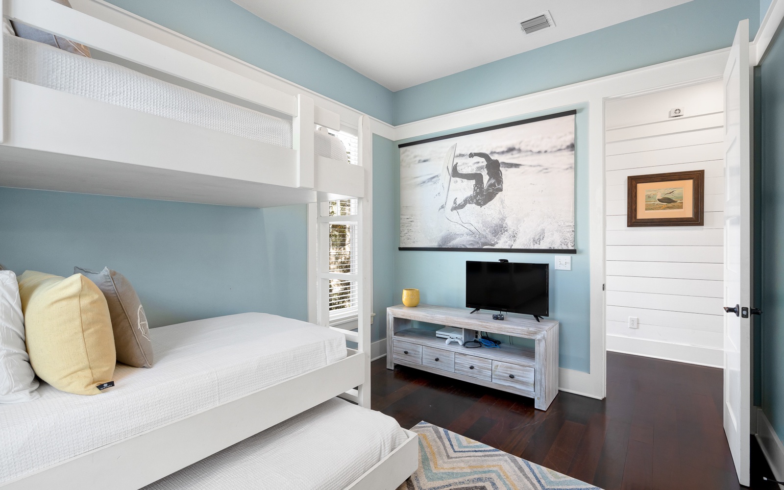 Your coastal-inspired room features custom bunk beds and ocean art, creating the perfect retreat for restful nights.