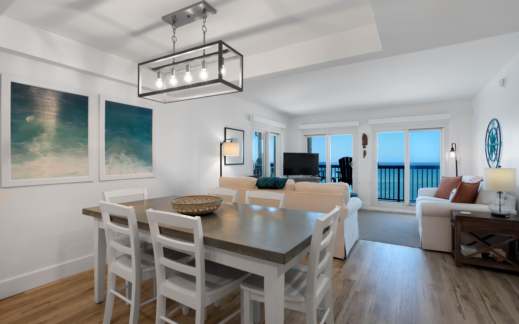 Unwind in your bright, modern living space where ocean views create the perfect backdrop for memorable meals and relaxing evenings together.