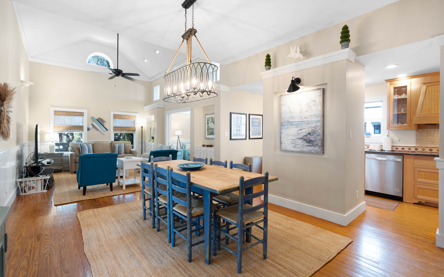 Gather around your spacious dining table where coastal charm meets comfort, perfect for memorable meals together.