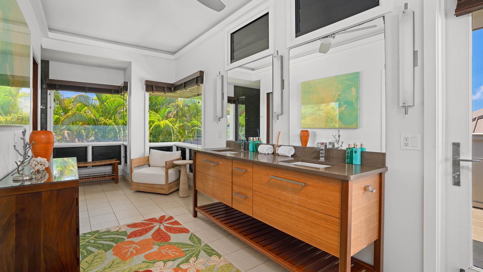 Luxurious bathroom with warm wood finishes and tropical garden views. Sink into relaxation as natural light and lush greenery frame your peaceful sanctuary.