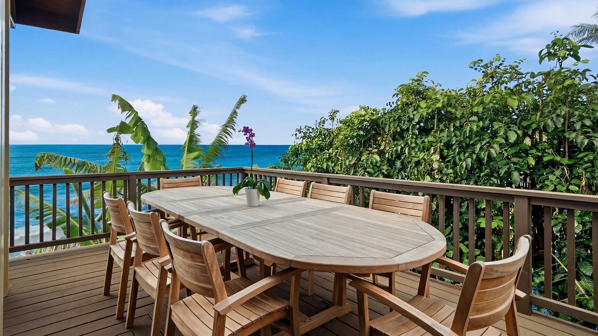 Your private terrace offers stunning ocean views where you can dine al fresco surrounded by tropical greenery and endless blue horizons.