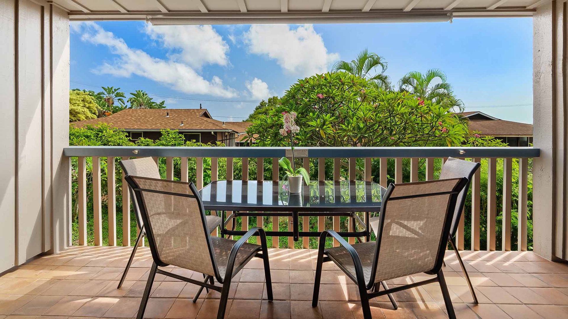 Sip your morning coffee on your private balcony, surrounded by lush tropical palms and sunny skies. The perfect peaceful start to your Hawaiian escape awaits just beyond the glass door.