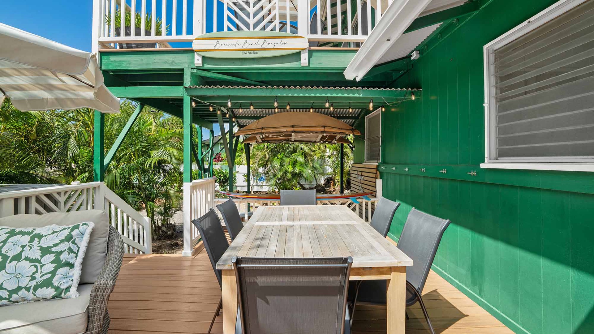 Picture yourself sharing meals under tropical skies at your private outdoor dining area. Palm trees sway overhead while you relax on plush seating, savoring every moment of your island escape.