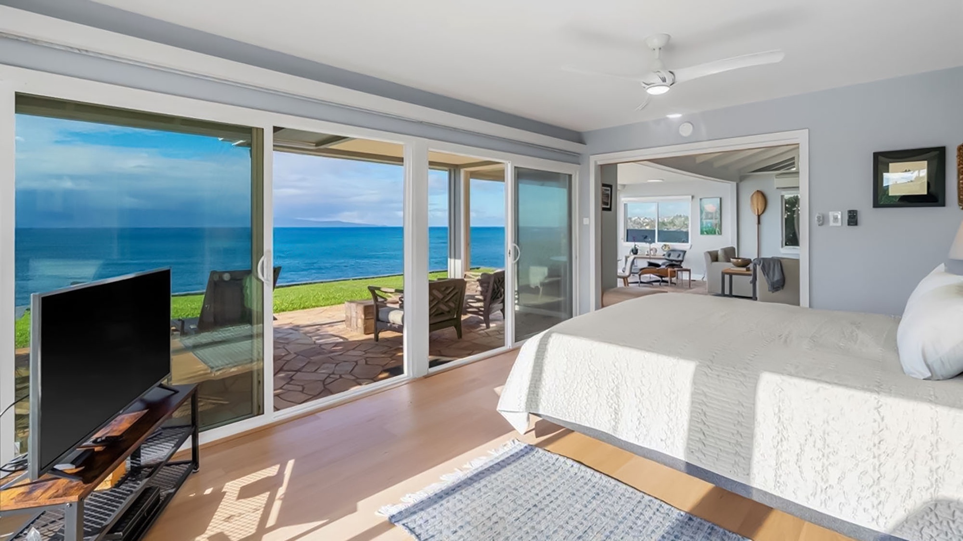 Wake to breathtaking ocean views through floor-to-ceiling windows. Your king bed faces the endless blue horizon while sliding doors open to seaside serenity.
