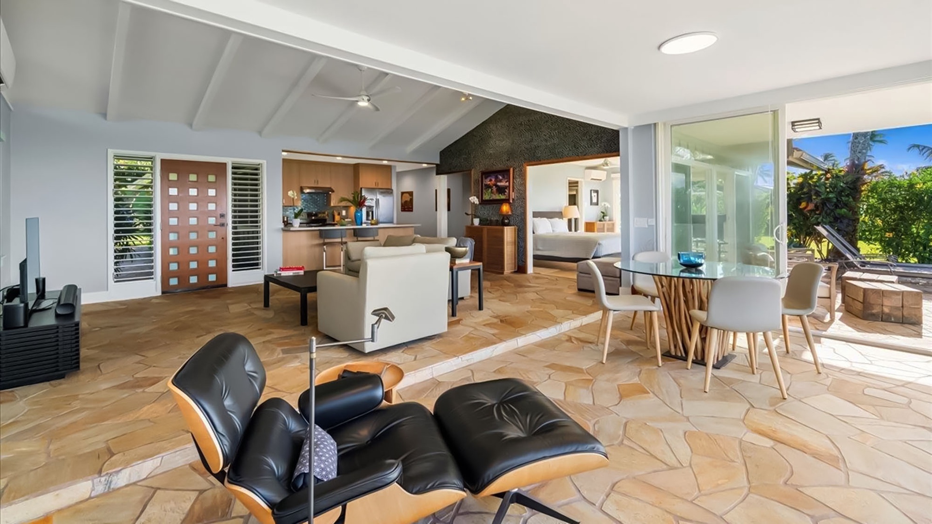 Unwind in this stunning open-concept space where modern luxury meets tropical charm. Your private retreat features sleek furnishings and seamless indoor-outdoor flow.