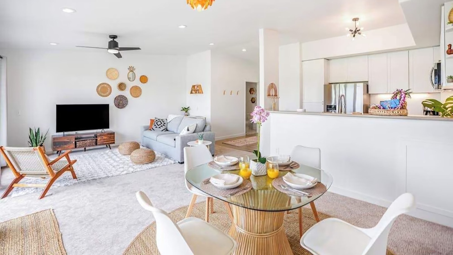 Your bright, open-concept space blends comfort and style—relax in the airy living area, then gather for fresh juice and breakfast at your cozy dining nook.