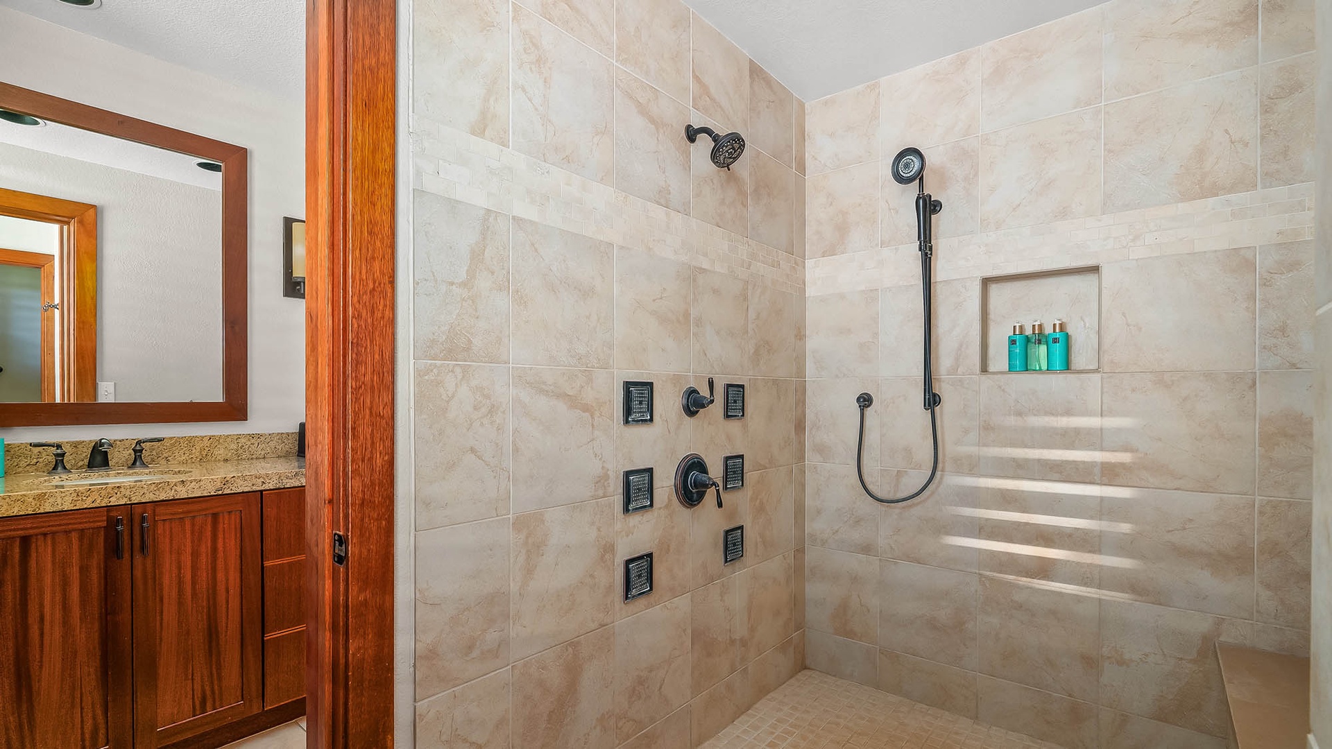 Step into your spa-like walk-in shower with dual showerheads and modern body jets—designed for pure relaxation after your adventures.