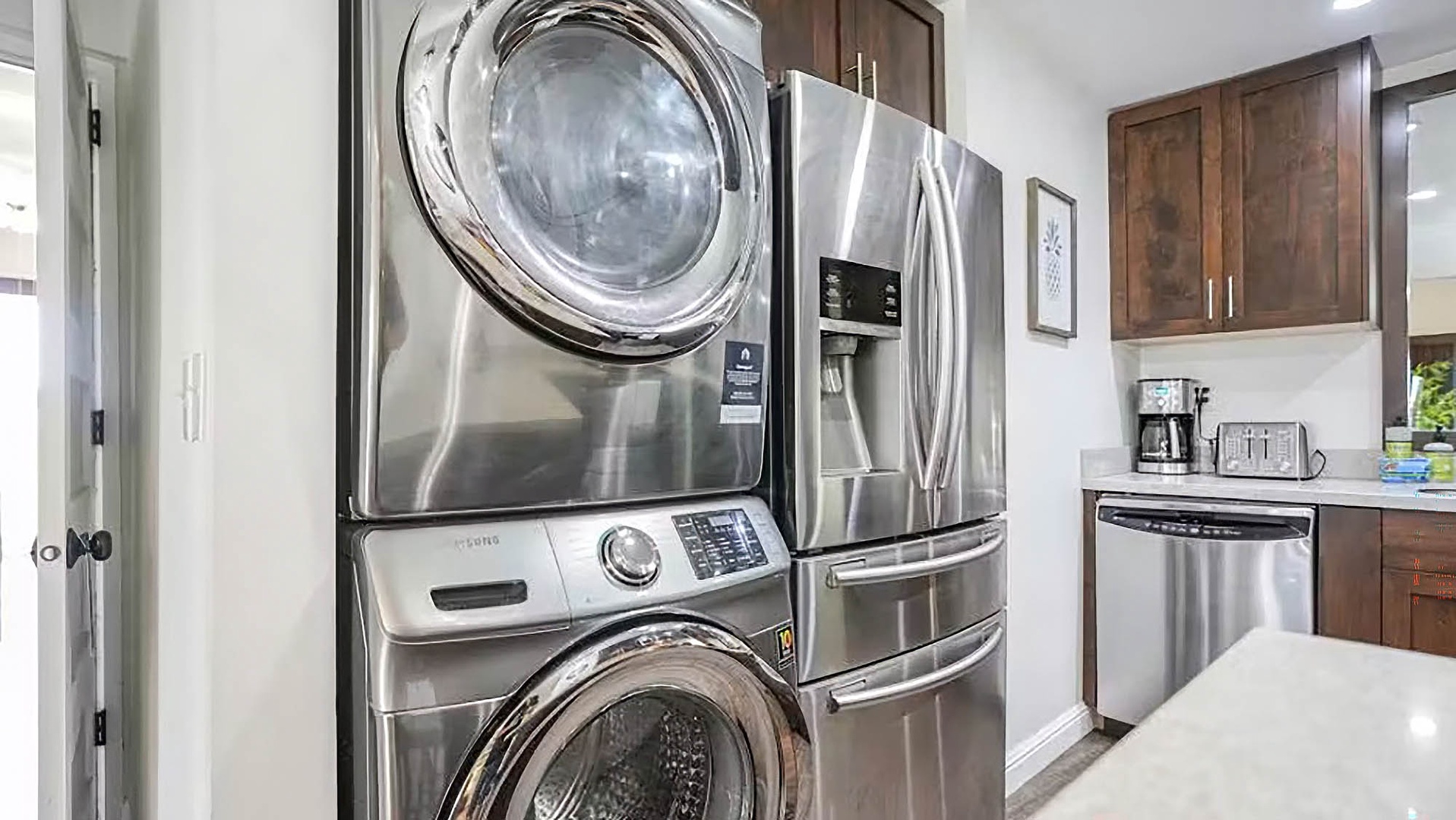 Your kitchen comes equipped with modern stainless steel appliances and an in-unit washer and dryer for ultimate convenience during your stay.