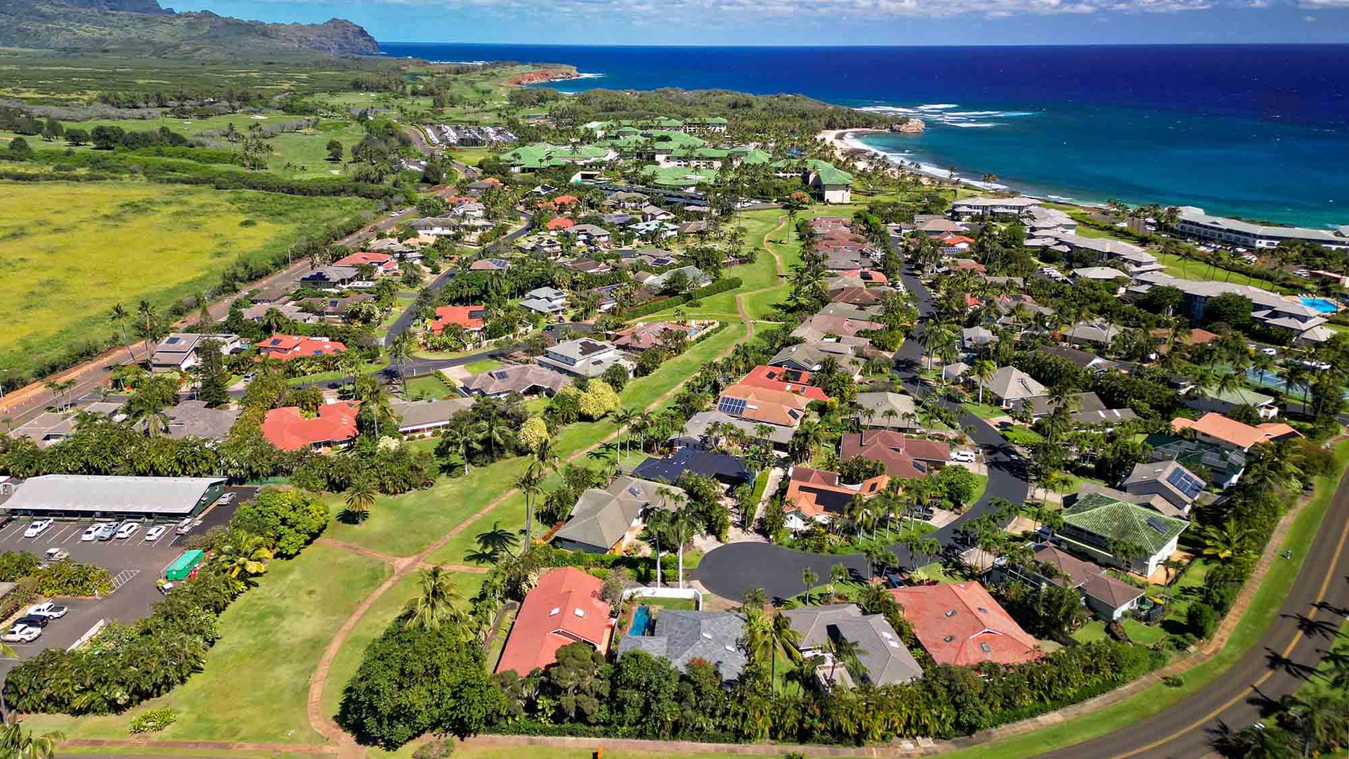 Nestled between lush mountains and sparkling ocean, this coastal community offers a serene island setting within easy reach of local beaches and natural beauty.