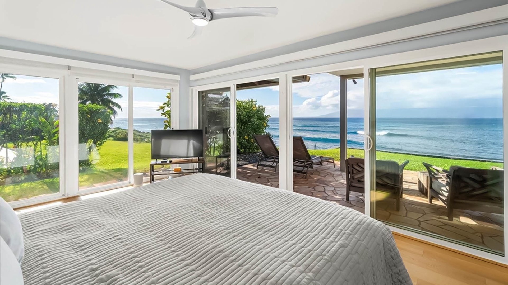 Wake up to breathtaking ocean views from your bed, with floor-to-ceiling windows framing endless blue waters and tropical paradise.