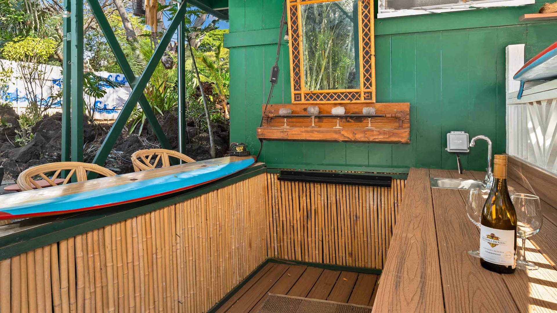 Relax on your private bamboo-accented deck with tropical garden views, perfect for savoring morning coffee or evening wine.