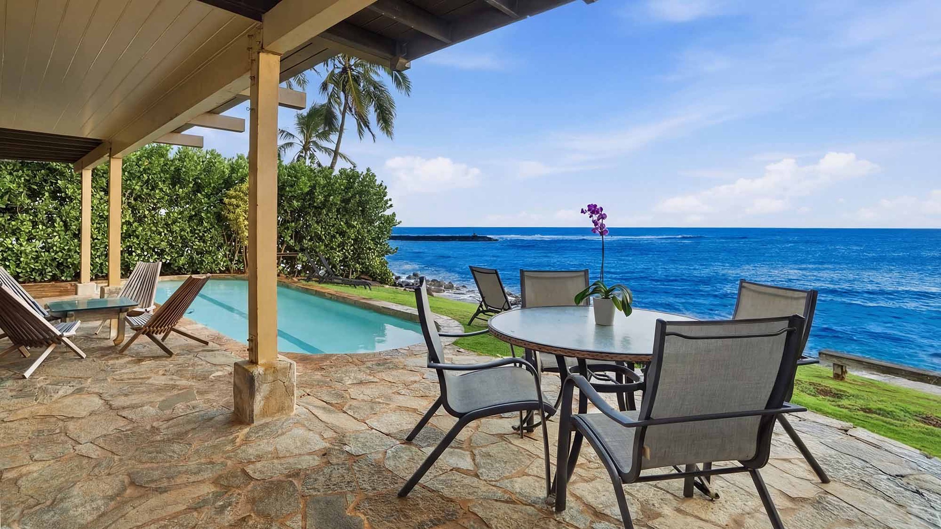 Your private oceanfront terrace offers stunning sea views where you can dine while waves crash just steps away from your infinity pool.