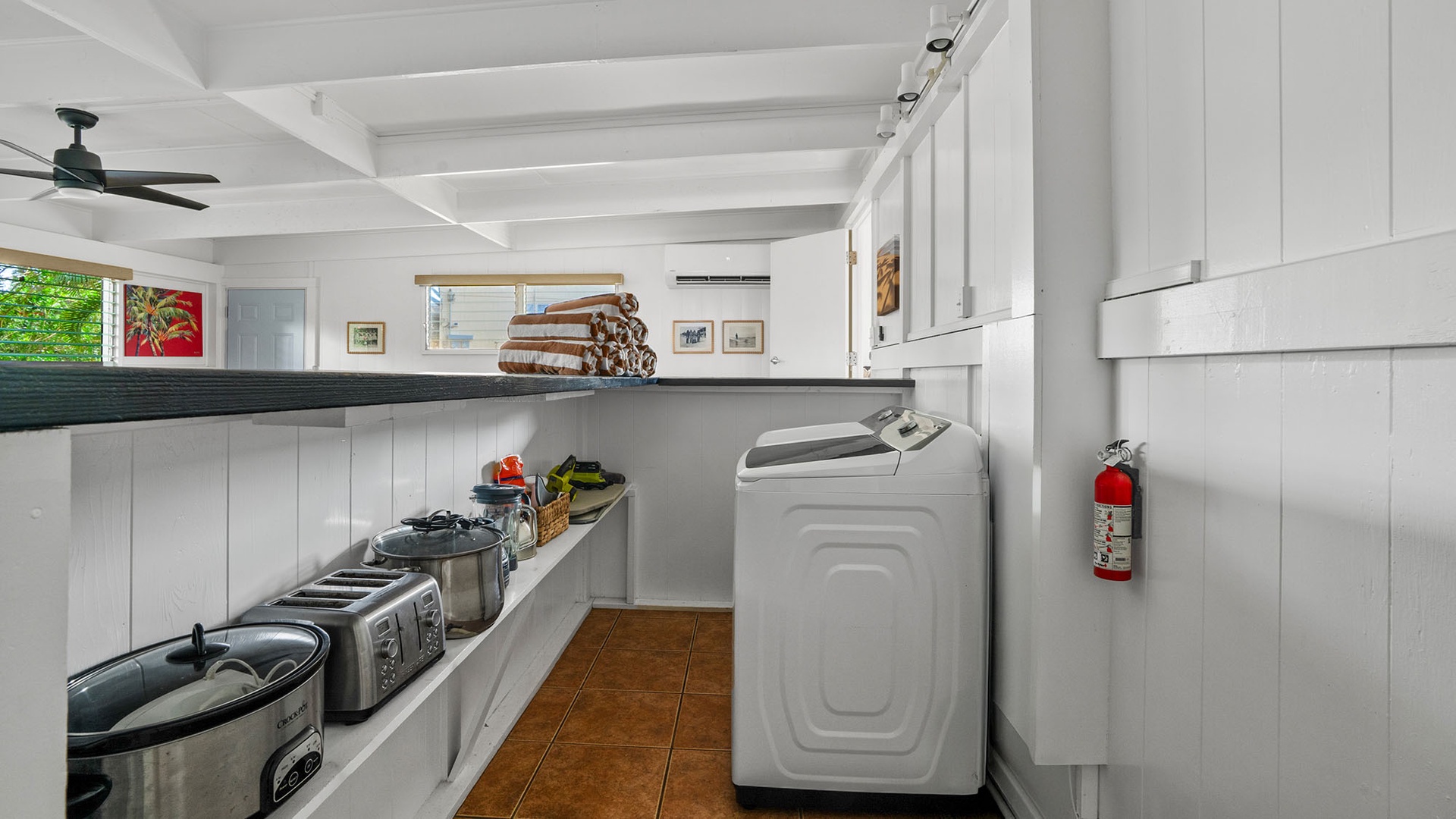 Your rental includes a well-equipped utility space with full laundry facilities and extra kitchen appliances for stress-free extended stays.