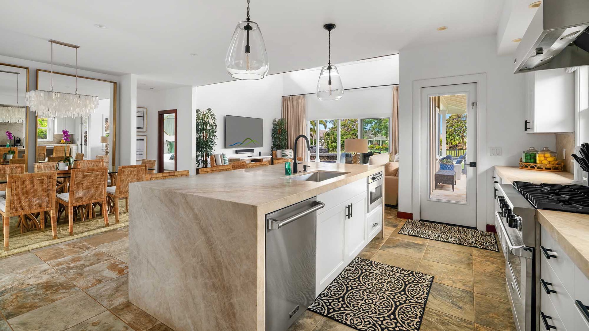 Sunlight fills your spacious kitchen and dining area, where marble countertops, modern appliances, and open views invite you to cook and gather with ease.