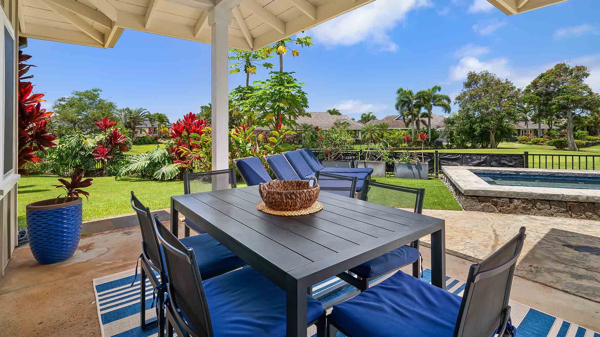 Picture yourself dining under the covered patio, surrounded by lush tropical gardens and sweeping golf course views. Your private pool and lounge chairs await just steps away for sun-soaked afternoons.