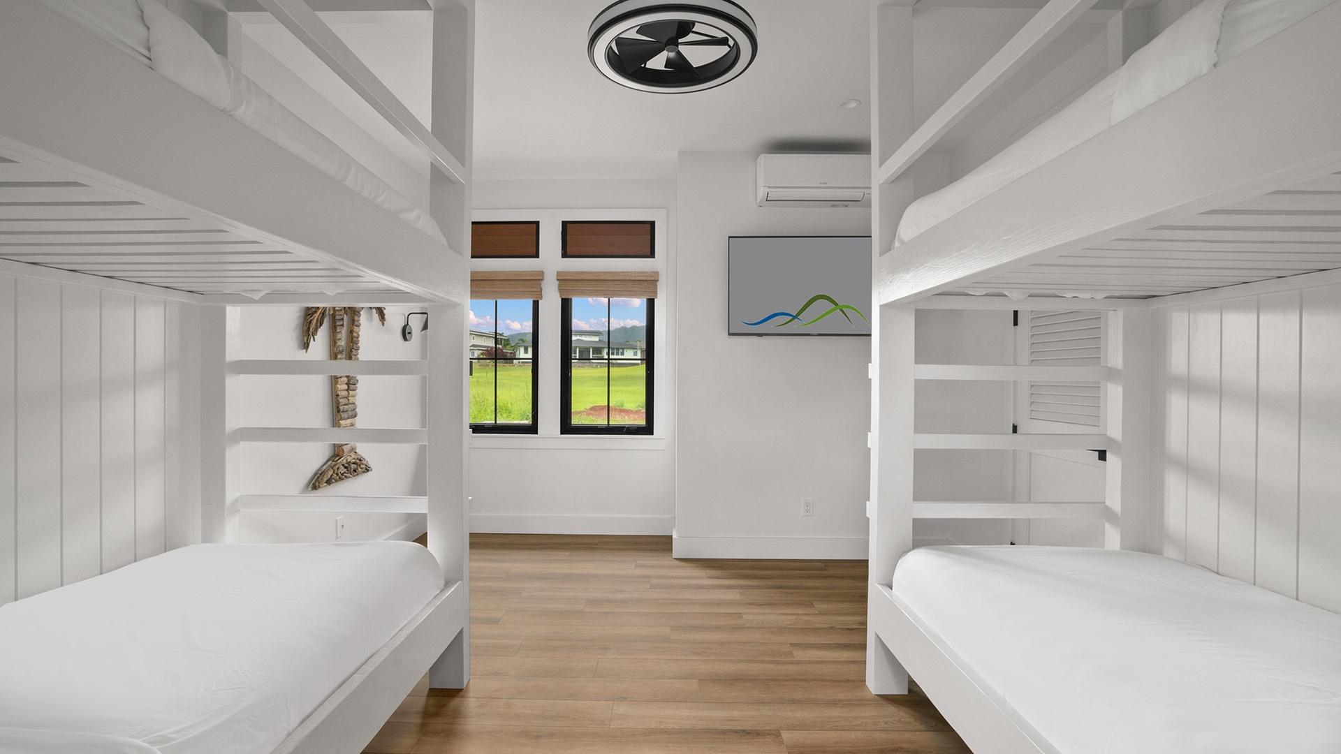 Your kids will love these custom bunk beds with built-in shelves and steps, creating the perfect adventure-filled sleeping space.