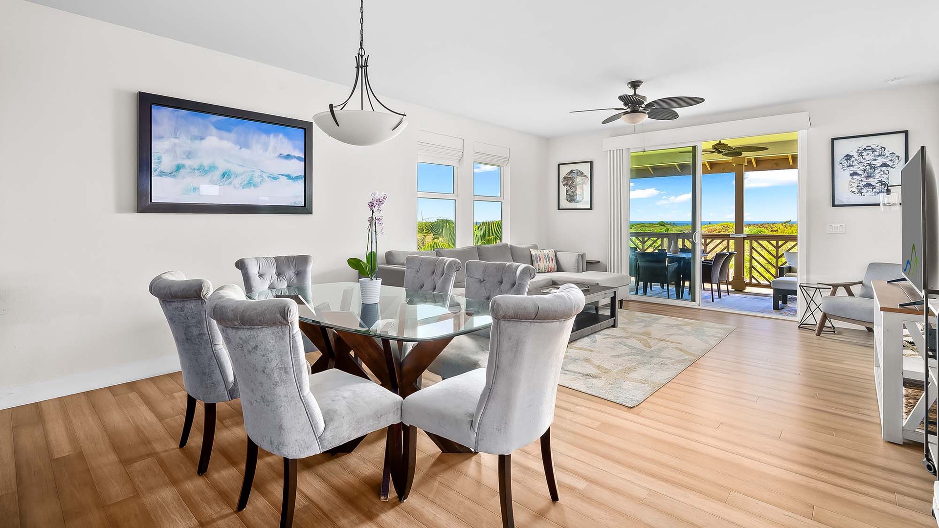 Gather around the elegant dining table or sink into the plush sofa, where natural light floods in and your private balcony frames sweeping views of lush greenery and open sky.
