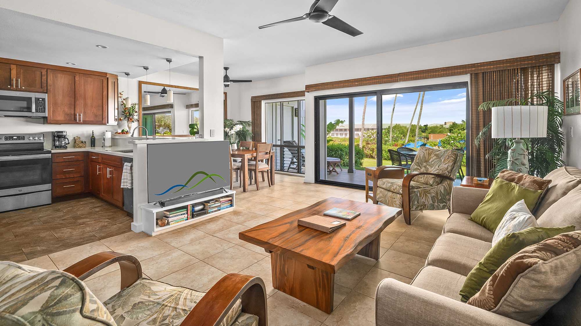 Unwind in your open-concept retreat where wood-toned warmth meets modern comfort. Ceiling fans keep you cool, and garden views through sliding doors invite you to step outside whenever you please.