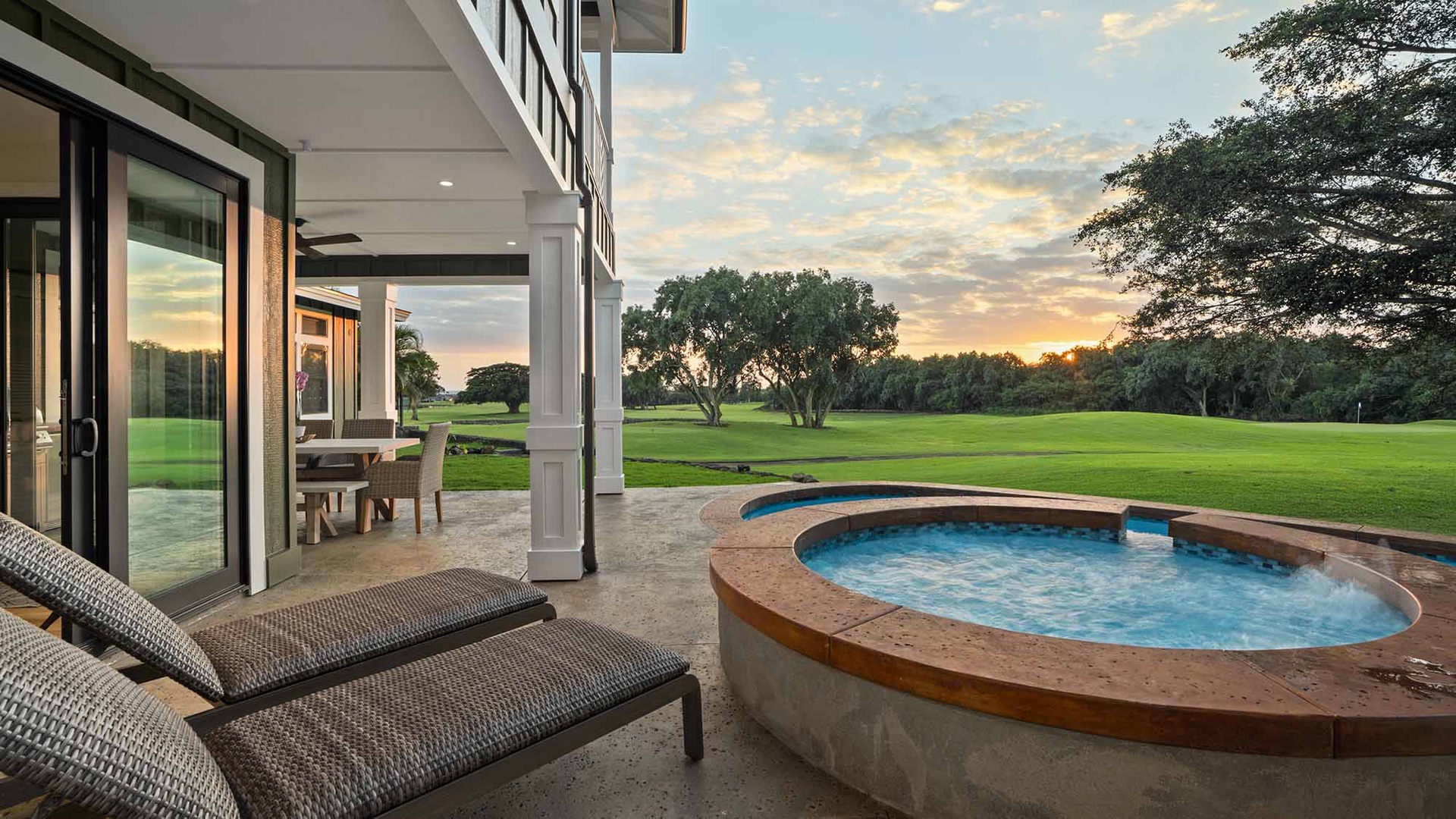 Unwind in your private hot tub while gazing across pristine golf fairways as golden hour light dances through the trees.