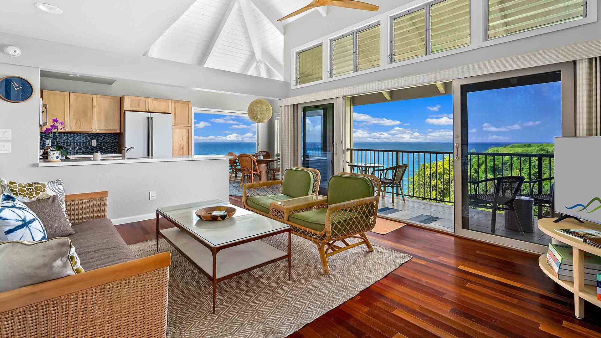 Step into your bright, open-concept living space where breathtaking ocean views await. Relax in the comfortable seating area, cook in your fully equipped kitchen, and step out to your private balcony to soak in the sea breeze.