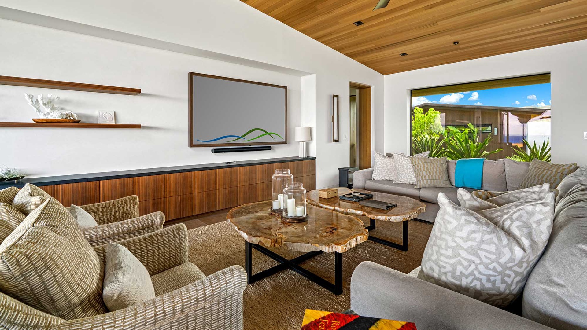 Sink into plush seating and let natural light flood your living space through floor-to-ceiling windows. The warm wood accents and unique live-edge coffee table create an inviting retreat where you can truly relax.