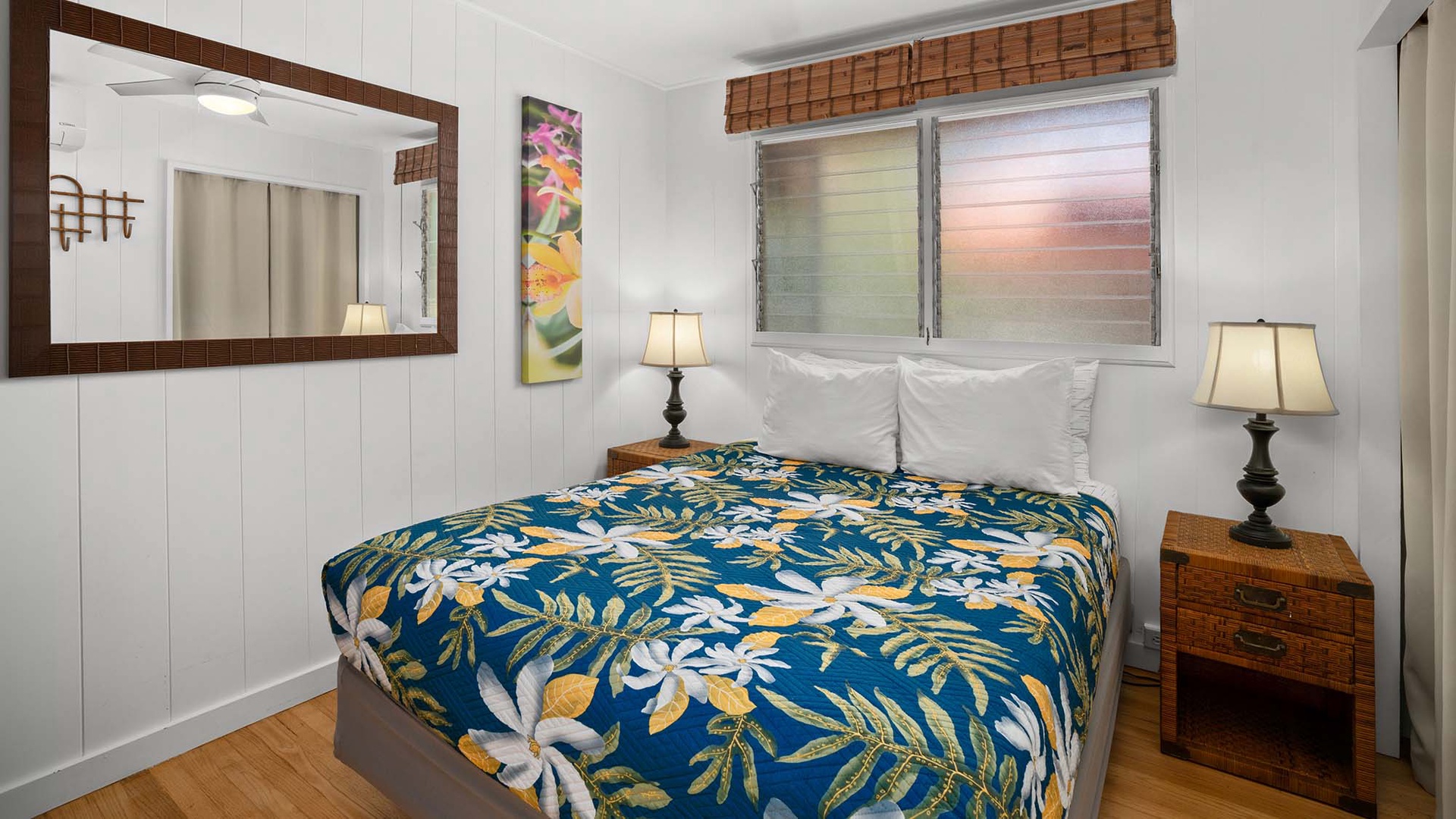 Drift off to sleep surrounded by tropical charm in your cozy bedroom with warm bamboo accents and gentle island breezes.
