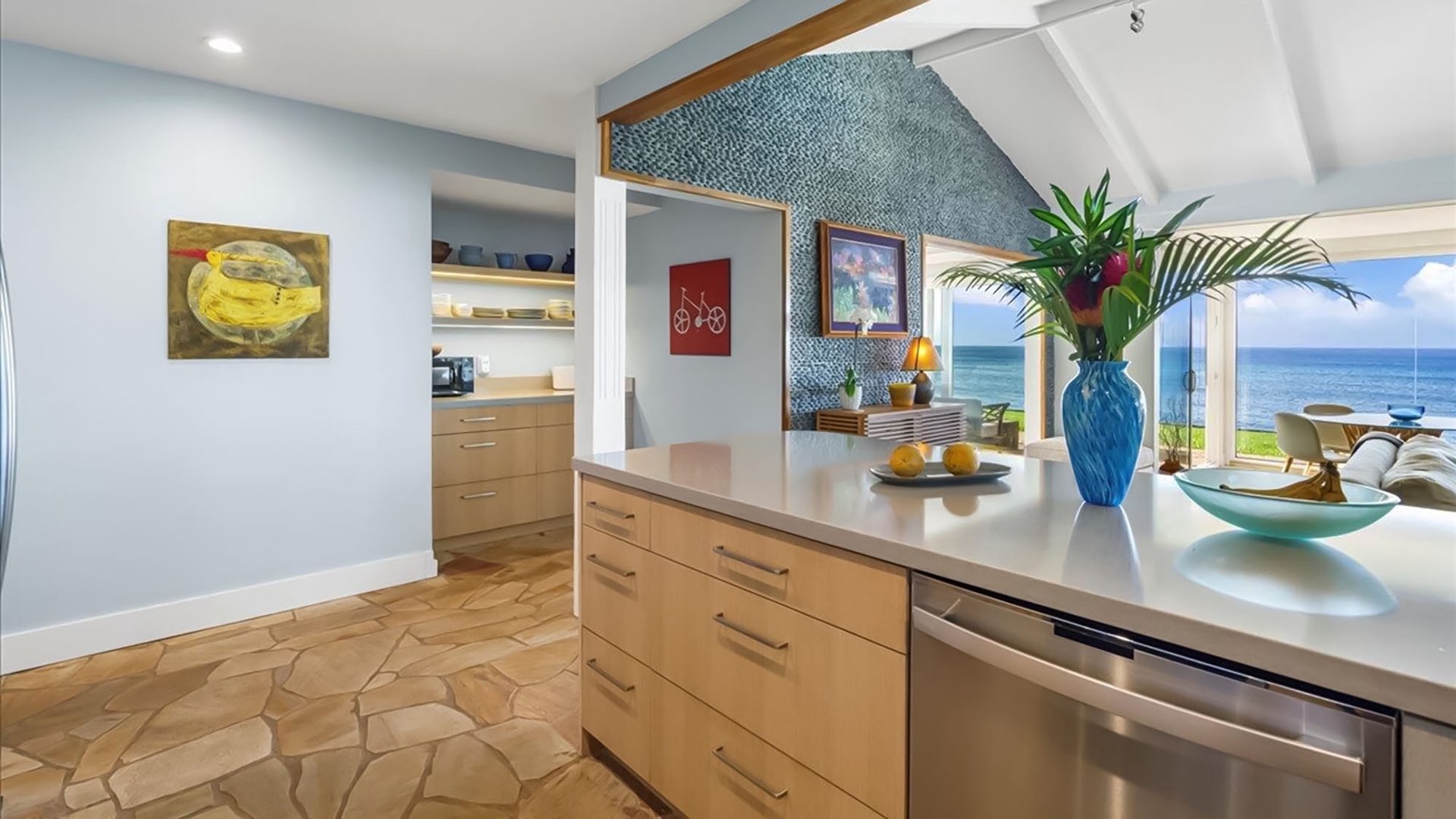 Cook with stunning ocean views from your modern kitchen, where sleek countertops and quality appliances make meal prep a joy.
