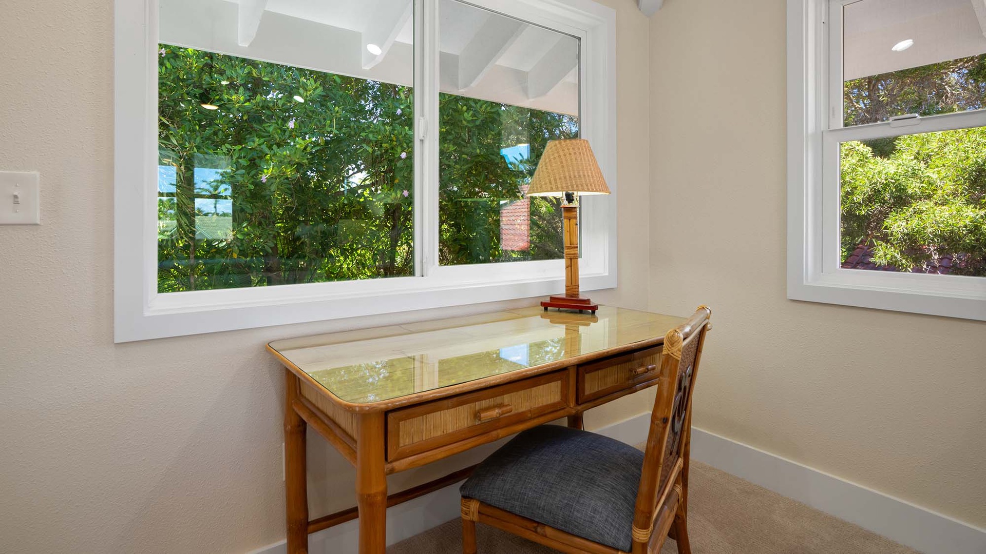 Settle in at your private workspace, where natural light and garden views create an inspiring setting for catching up on work or journaling your vacation memories.
