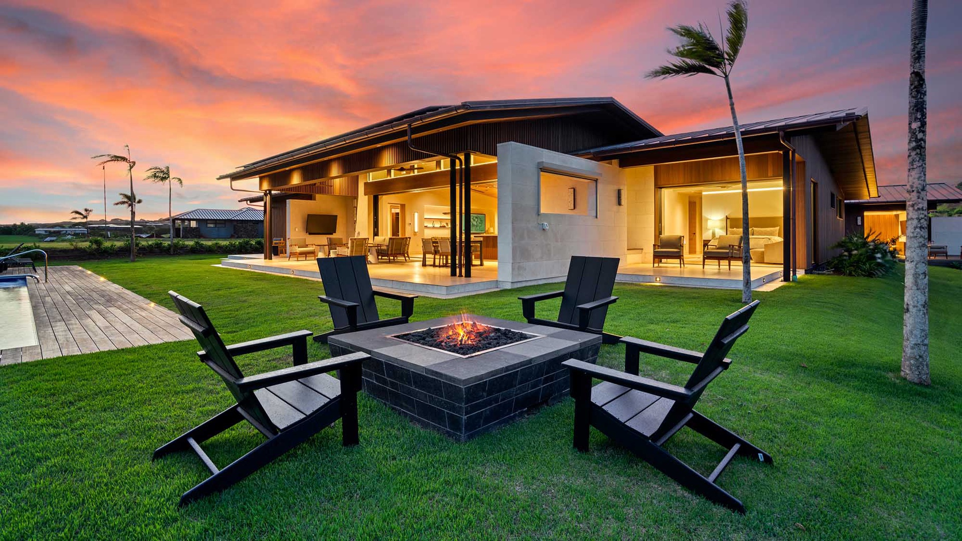 Gather around the outdoor fire pit as twilight paints the sky in brilliant coral and lavender, the perfect setting for starlit conversations and s'mores with loved ones.