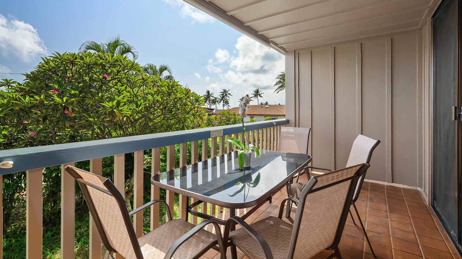 Sip your morning coffee on your private balcony, surrounded by tropical palms and gentle island breezes—a perfect spot to unwind and soak in the serene atmosphere.
