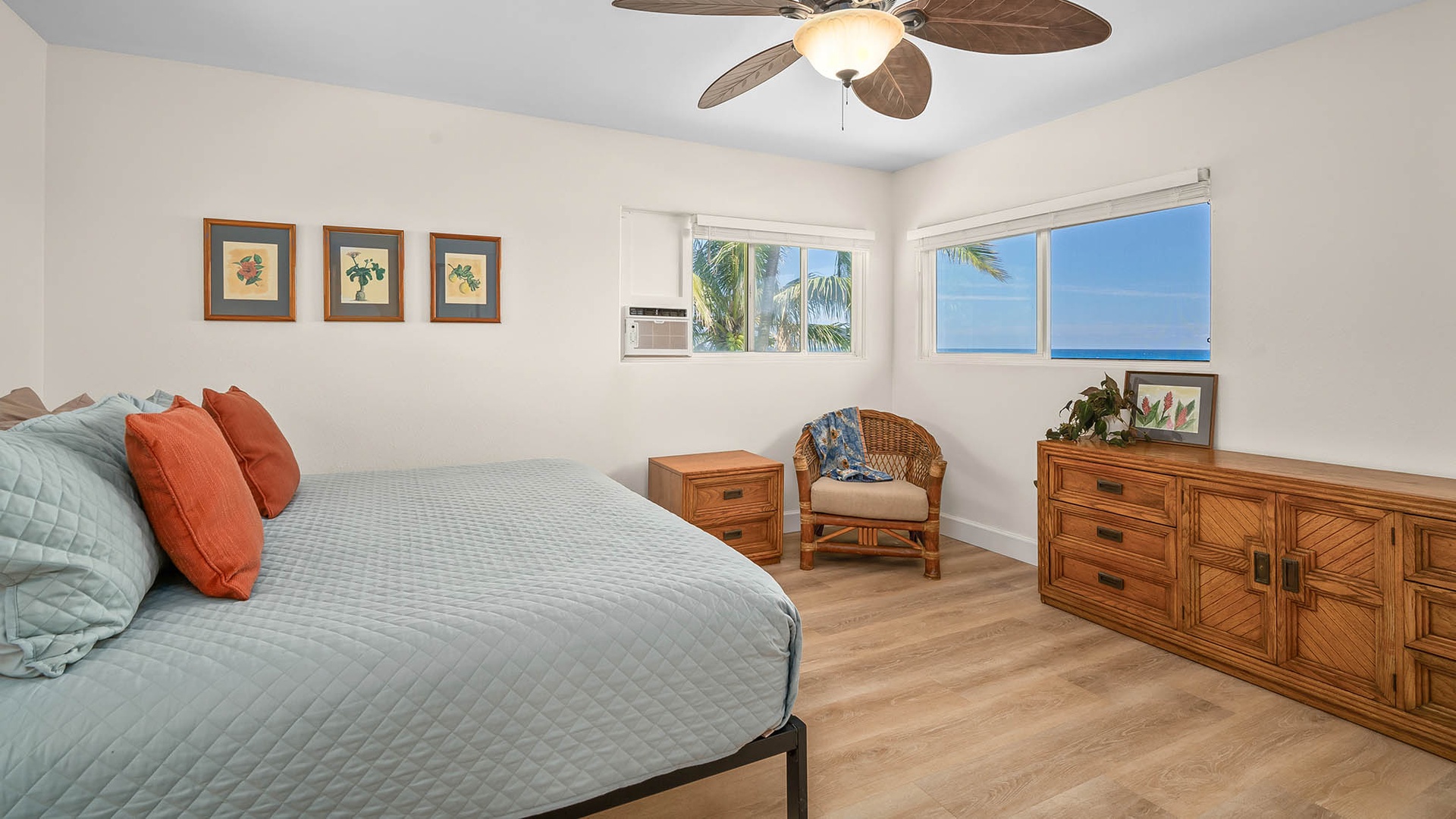 Wake up to stunning ocean views framed by your bedroom windows. The tropical ceiling fan and island-inspired furnishings create your own private paradise by the sea.